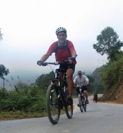 Peter Dilks Cycling on the  tour with redspokes